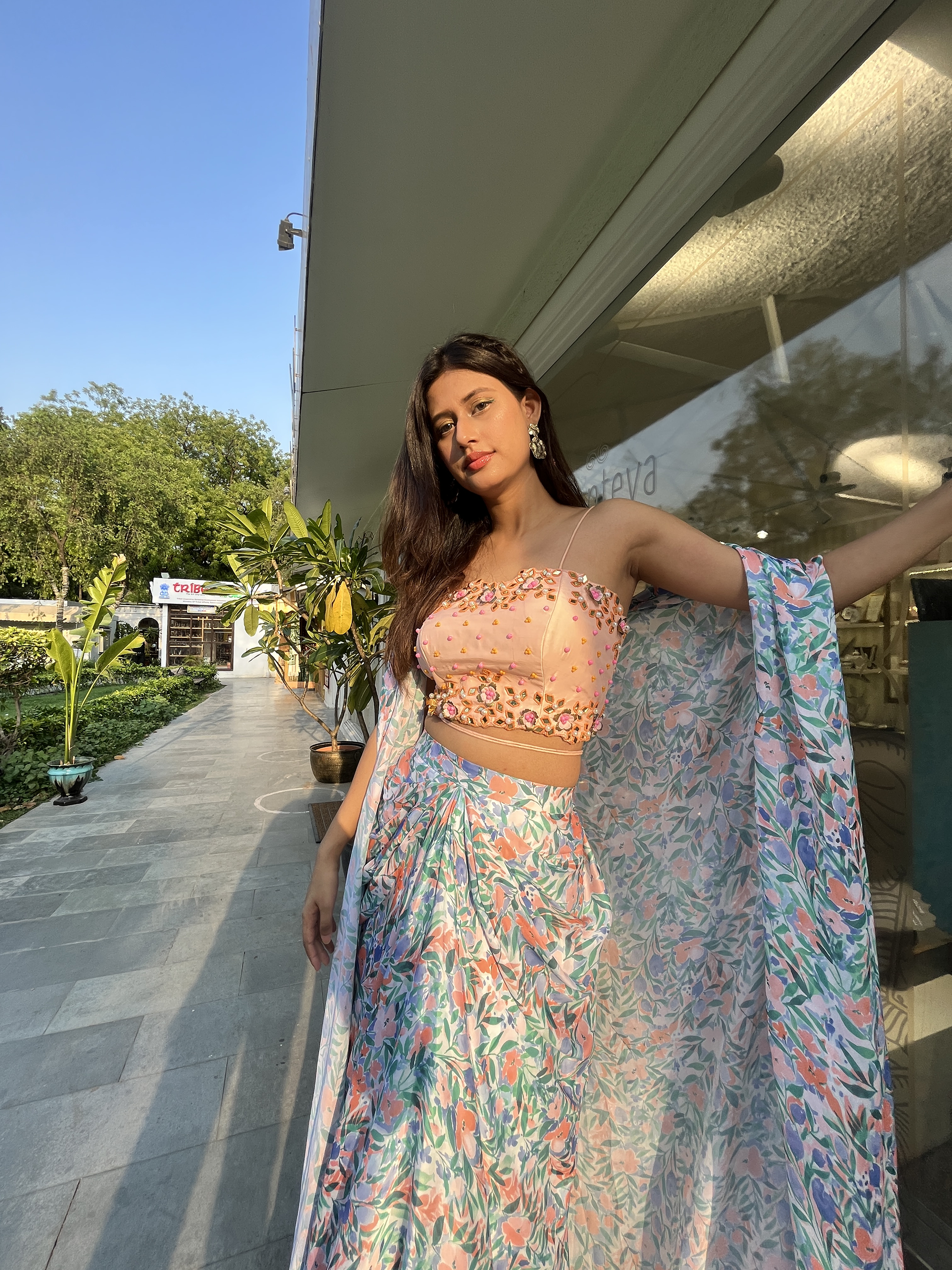 Peach embroidered blouse with leaves printed dhoti set